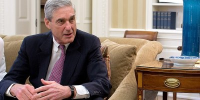 During his tenure as FBI Director, Robert Mueller visits President Obama's Oval Office in 2012.